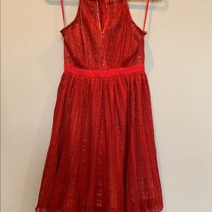 Francesca’s red dress with adjustable cut out